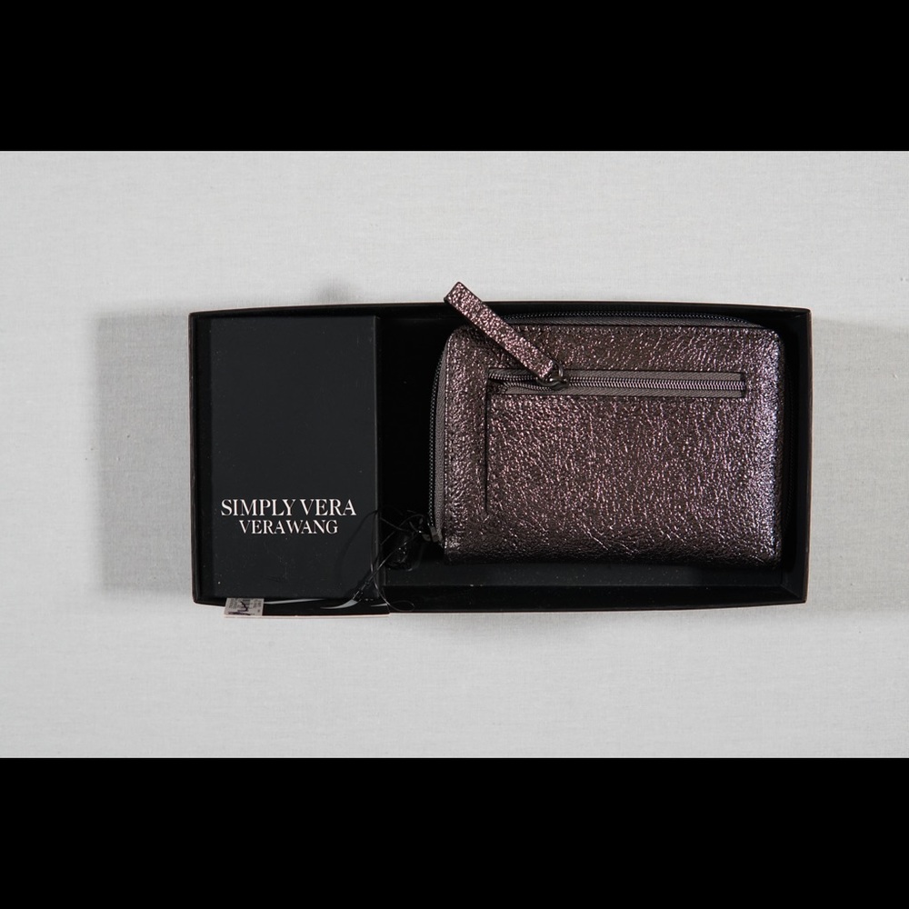 Never used Purse. Trendy Metallic Look